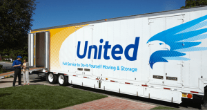 United Van Lines truck with mover talking to customer